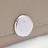 Pebbleグレインカーフスキン製の「Pebble スモール バーティカル 財布」 Pebbleグレインカーフスキン製の「Pebble スモール バーティカル 財布」